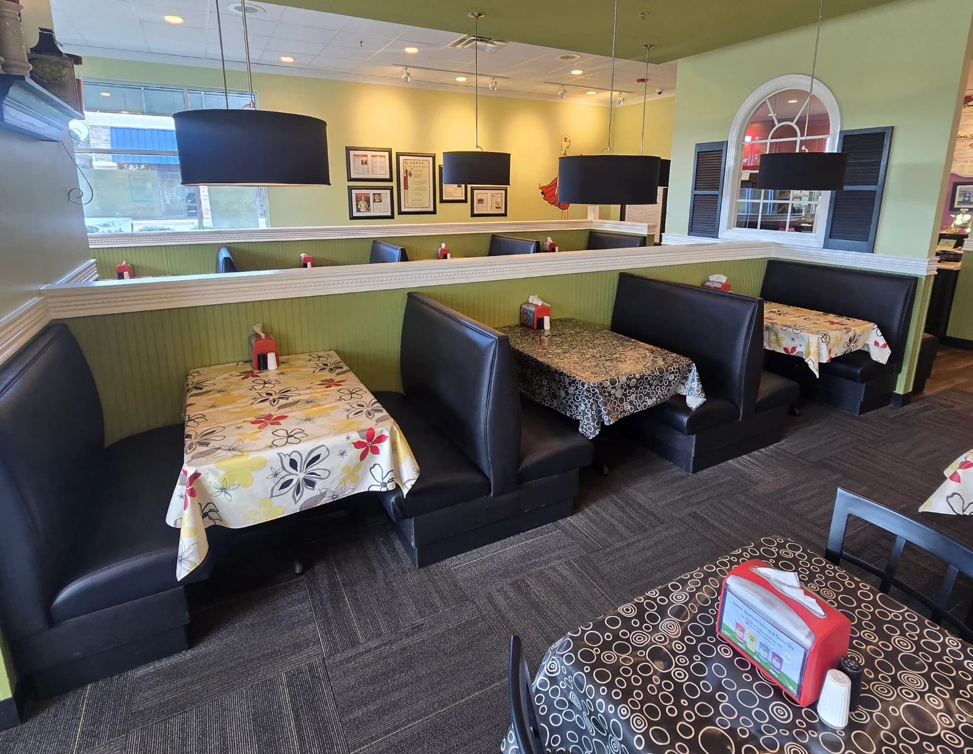 Finished black vinyl hospitality booth seating