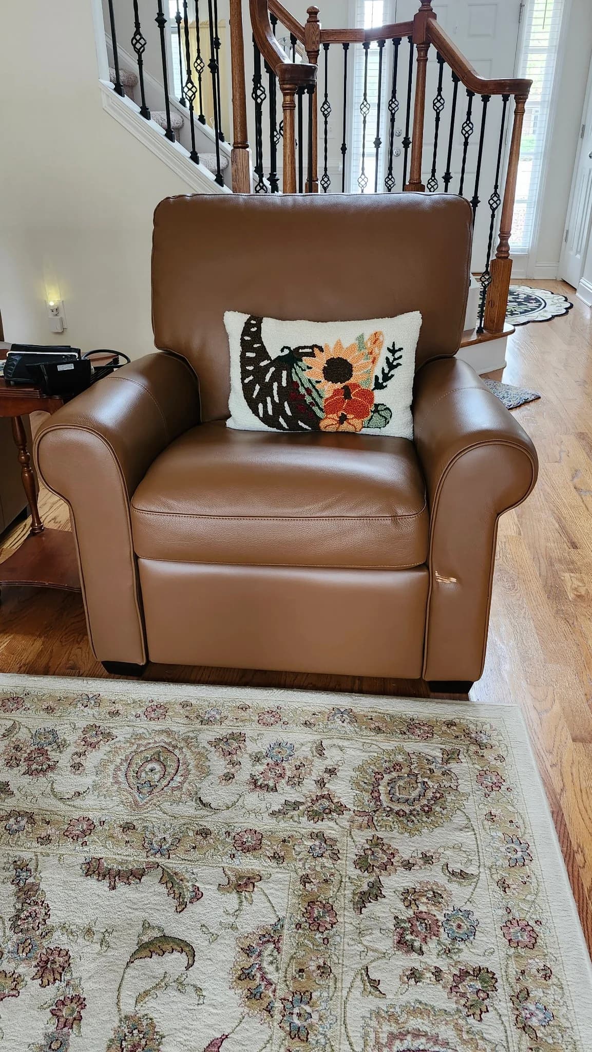 Restored tan leather recliner in living room